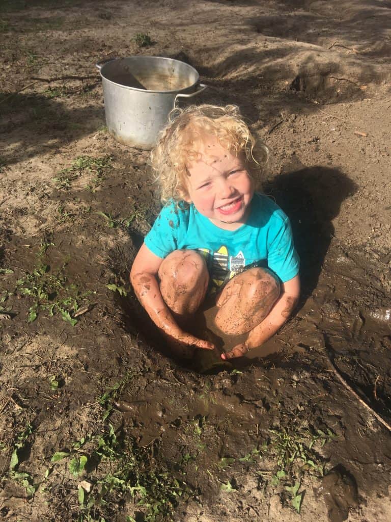 Christian Taking a Mud Bath
