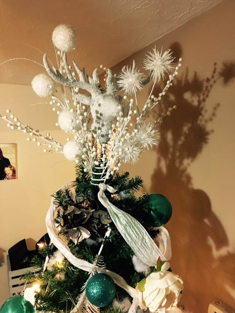 Our glittery deer tree topper + a bunch of other decorations I added to it!
