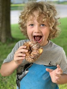 Butler County Donut Trail preschooler eating a donut