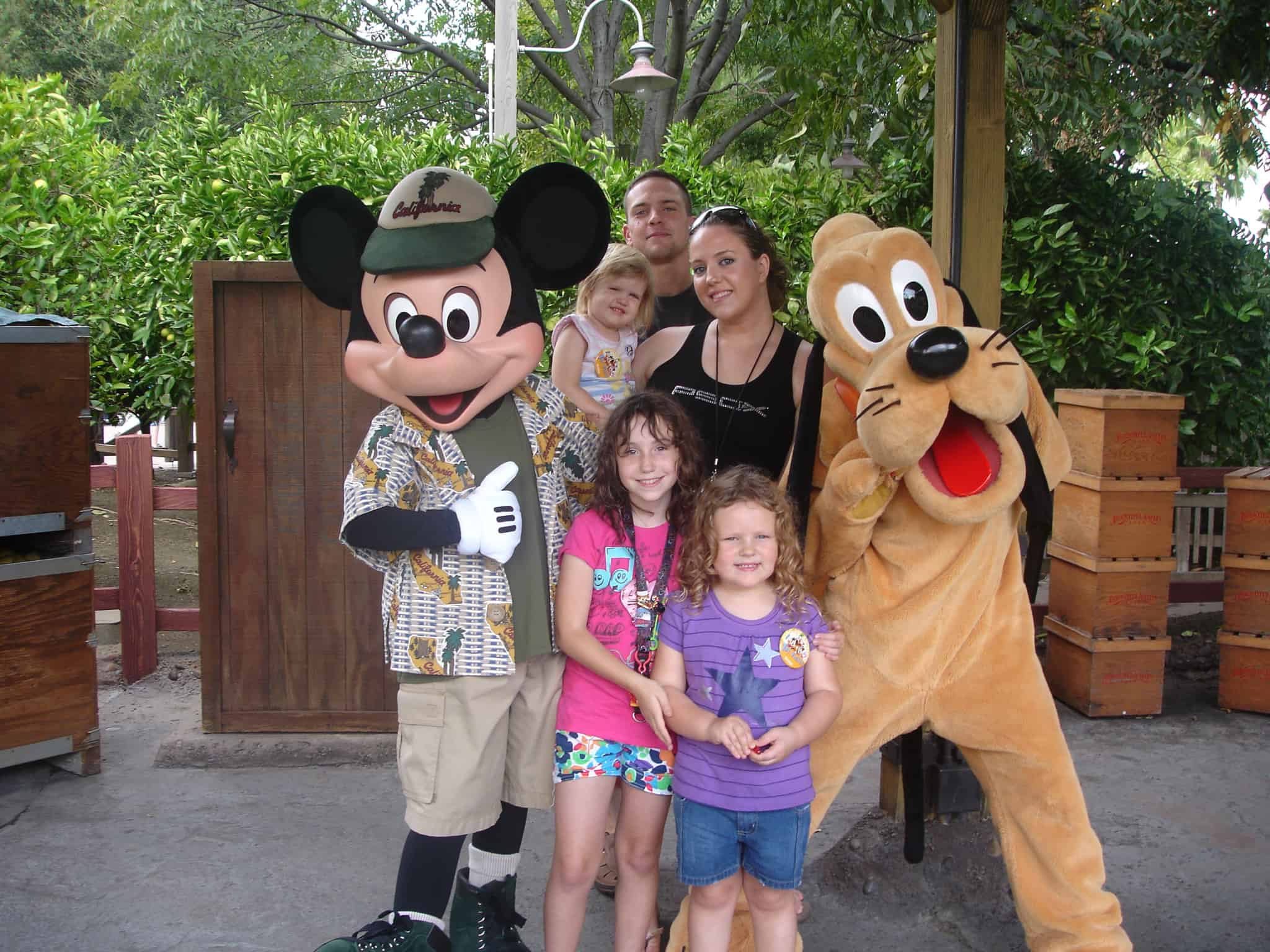 Posing with Mickey and Pluto! The best no wait Disneyland rides