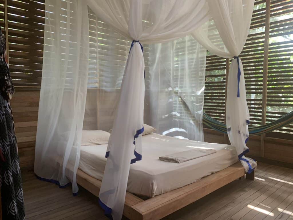 Photos of the Amazon: A bed with a mosquito net at a commune about 20 minutes outside of Leticia, Amazonas, Colombia—in the heart of the rainforest