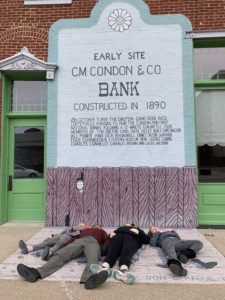 Laying in front of Condon Bank in Coffeyville KS