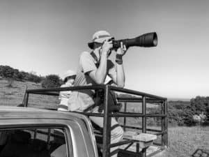 Matthias taking pictures of birds at Enonkishu Conservancy in the Maasai Mara, Kenya