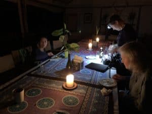 Eating dinner during a power outage at Enonkishu Conservancy in Kenya