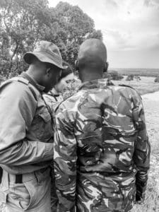 Rangers discussing the project at Enonkishu Conservancy in the Maasai Mara, Kenya