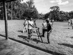 Demonstrating how to use a Kenyan ladder at Enonkishu Conservancy in Kenya