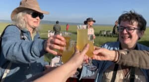 Doing a champagne toast after hot air ballooning in the Maasai Mara, Kenya