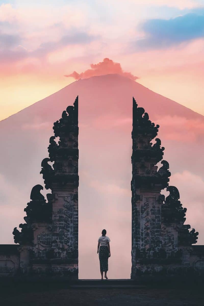 photo of person standing on a famous temple