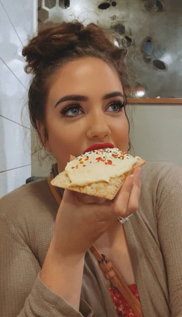 Kathy Haan eating a poptart at HomeGrown in Wichita (South Central Kansas)