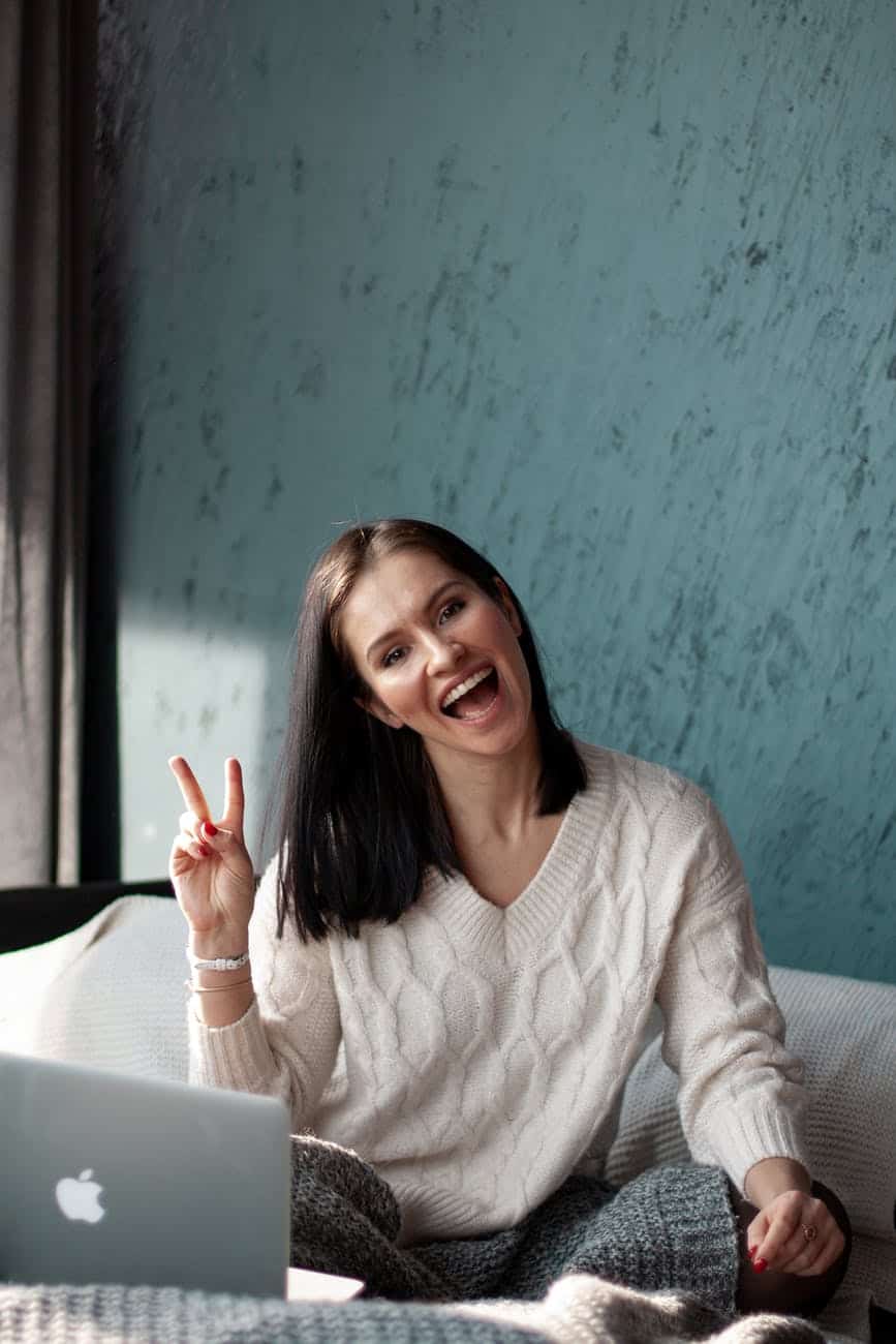 woman in brown knit top