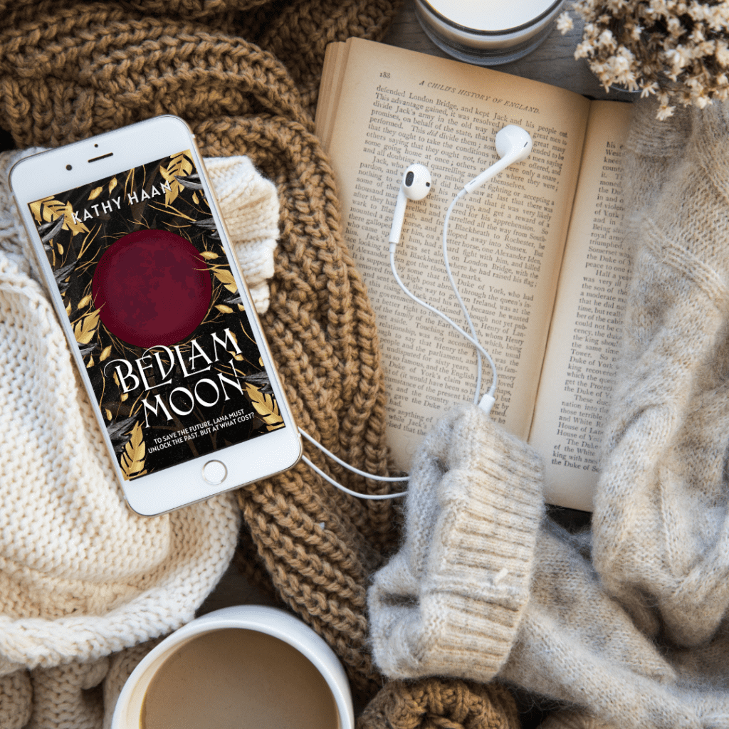 valentine's day gifts for her; Bedlam Moon book on the phone