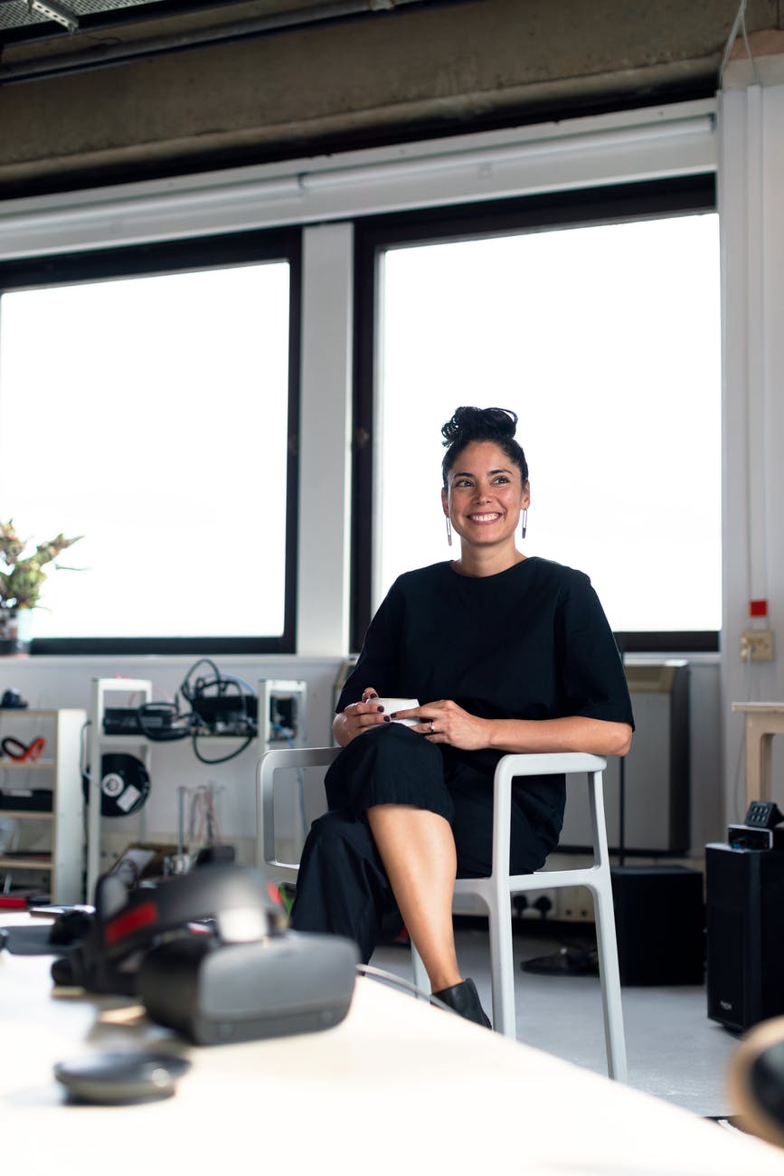 portrait of woman sitting on chair