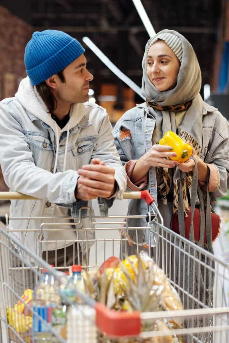 couple buying groceries at a supermarket