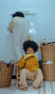 positive siblings in modern laundry room