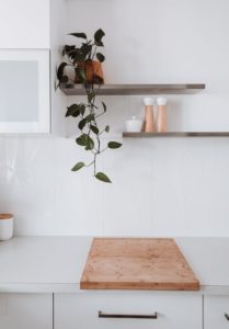 interior of light kitchen in modern apartment