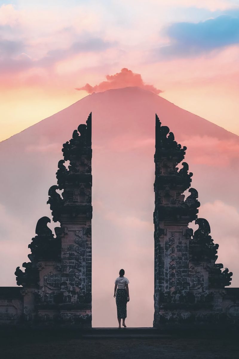 photo of person standing on a famous temple