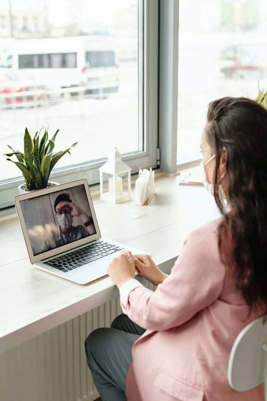 woman using her laptop on video call