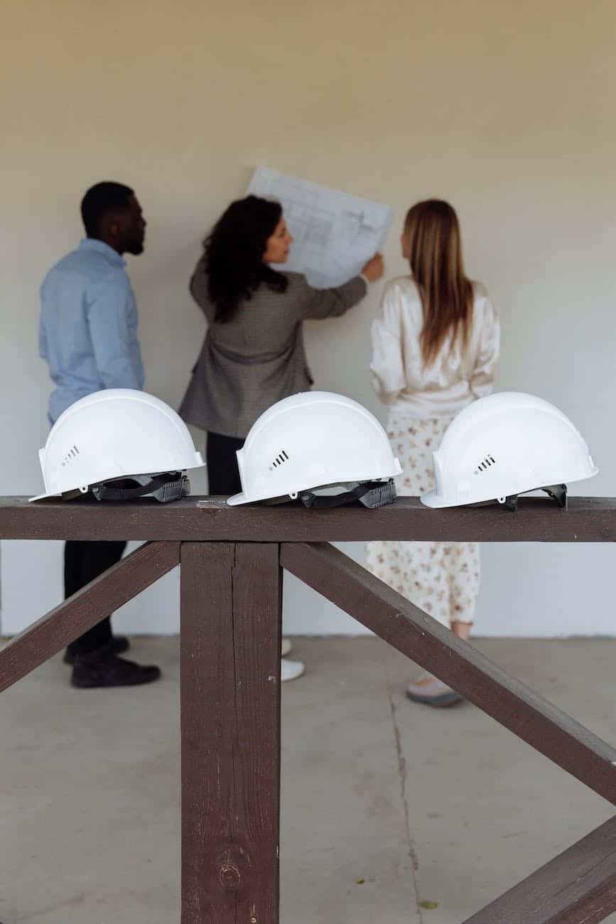 man and women looking at house floor plan