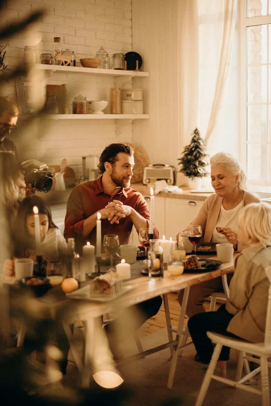 people sitting beside table