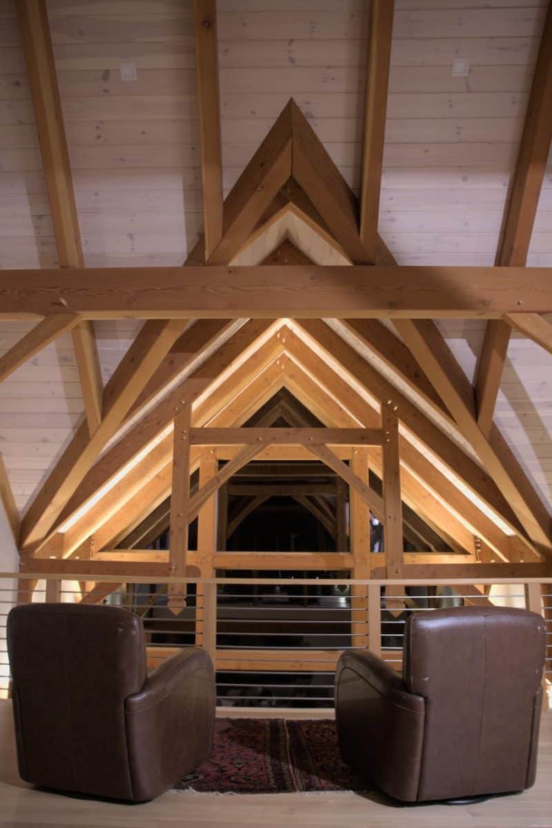 a house with wooden ceiling triangular design