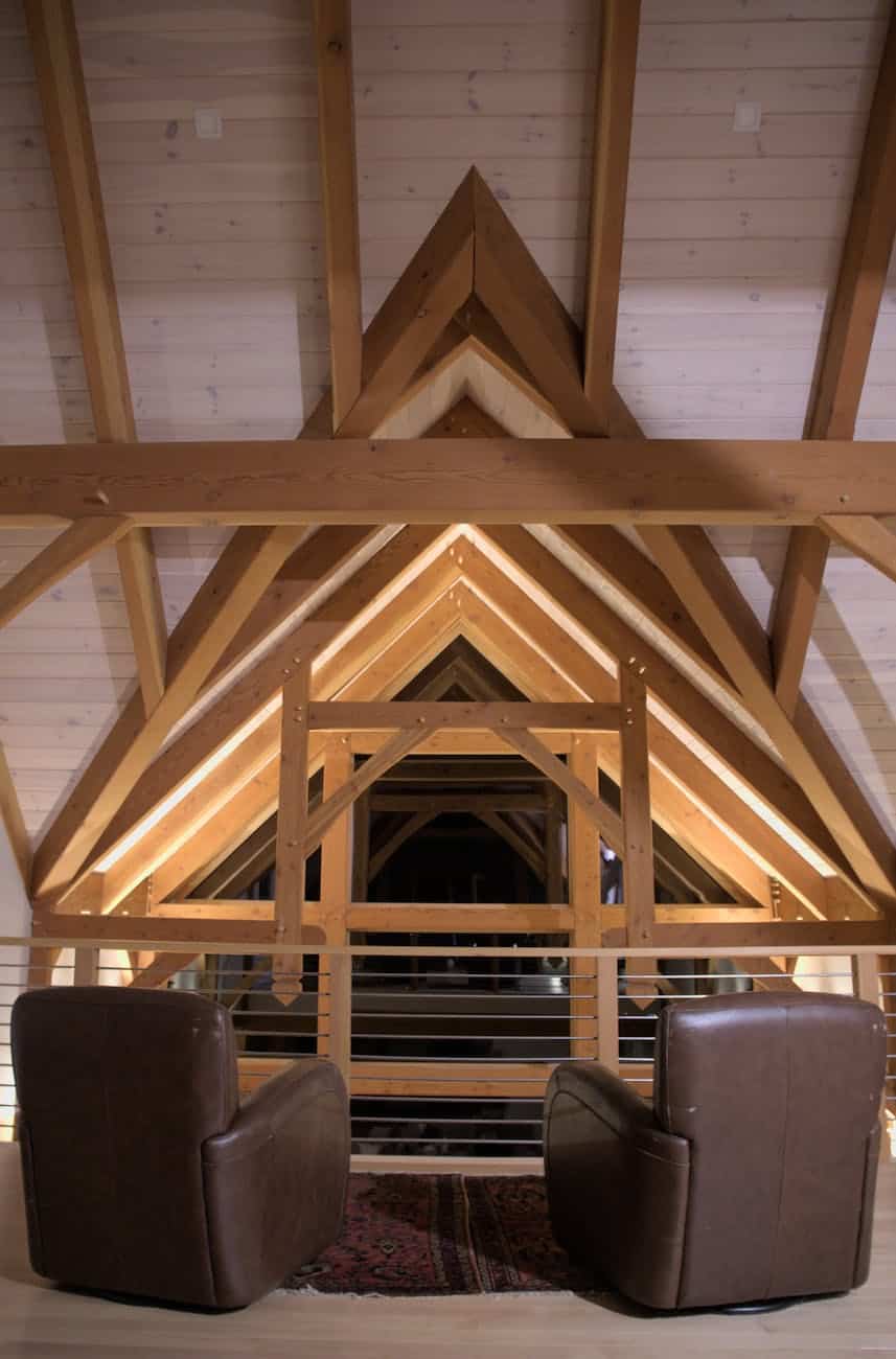a house with wooden ceiling triangular design