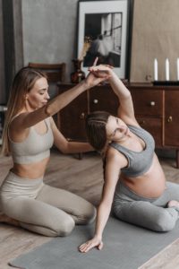 women doing pilates at home
