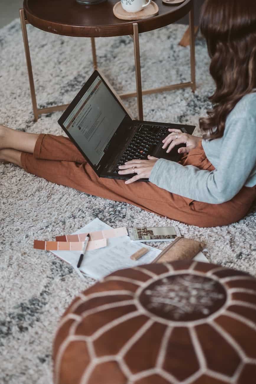 photo of woman sitting on ground