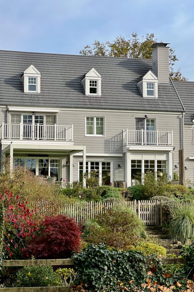 gray wooden house with balconies