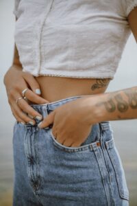 person with tattoo on right arm