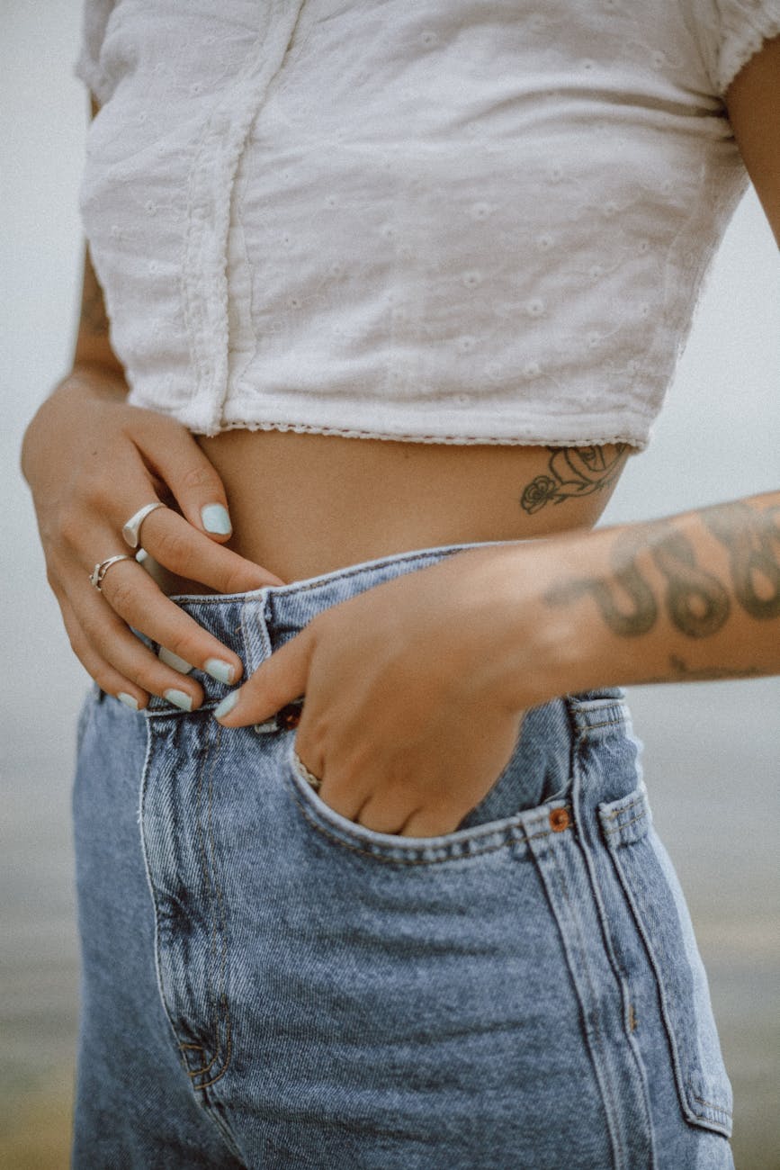 person with tattoo on right arm