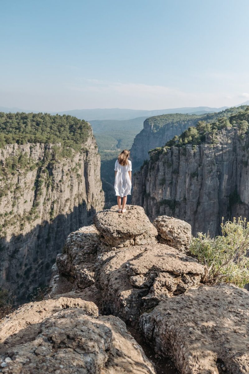 back view of a woman in a white dress at tazi kanyonu