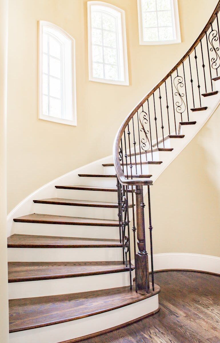 white and brown concrete helix stairs