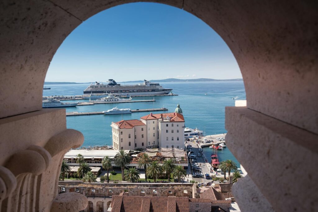 view of a coast and cruise ship on the sea in split croatia