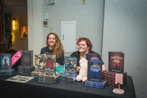 At a book signing event with my oldest, Leo, who does almost all of my book covers