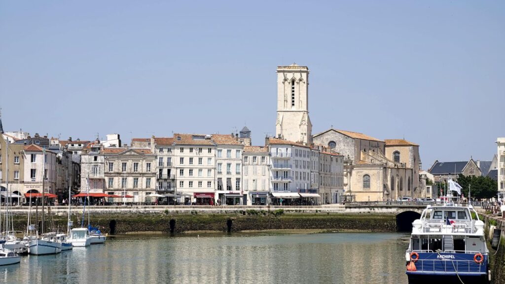 Waterfront view of La Rochelle with historic buildings and boats