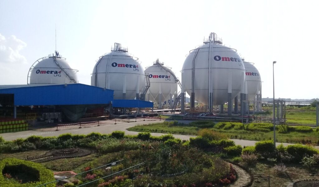 Large spherical LPG gas storage tanks at an industrial facility, representing fuel production and supply infrastructure.