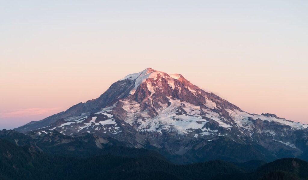 Snow-covered Mount Rainier at sunset in Mount Rainier National Park, Washington.