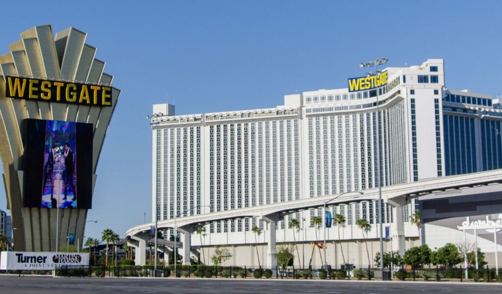 Exterior view of Westgate Las Vegas Resort & Casino with monorail track in front, highlighting hotel resort infrastructure.