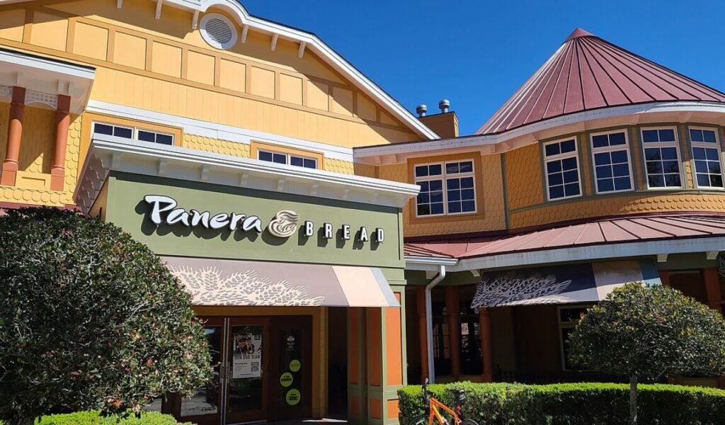 Panera Bread restaurant with a decorative exterior and green sign.
