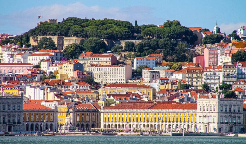Colorful buildings and Praça do Comércio waterfront in Lisbon, Portugal