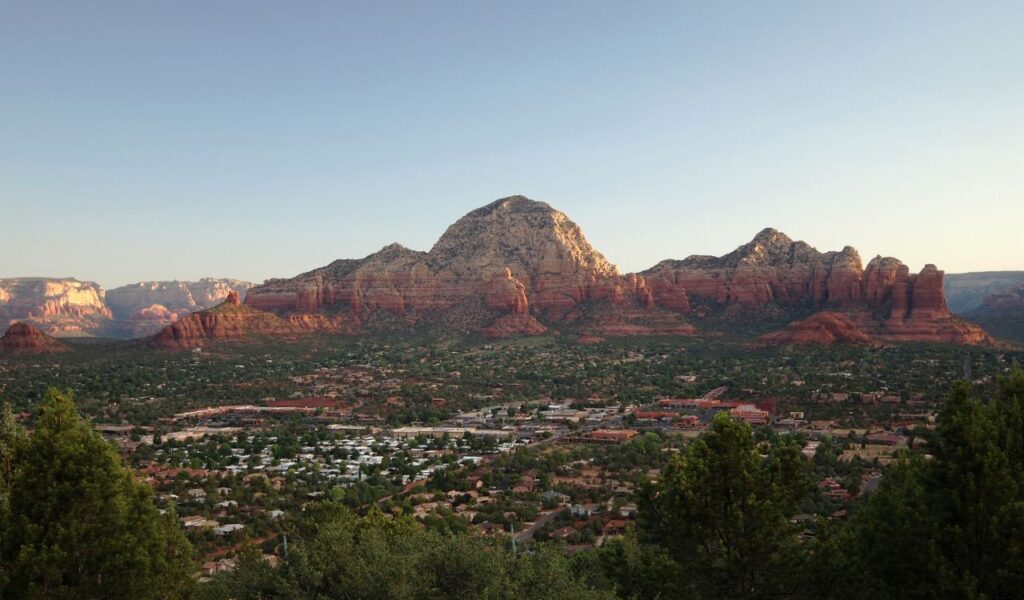Sedona Arizona red rock mountains and scenic small town at sunset