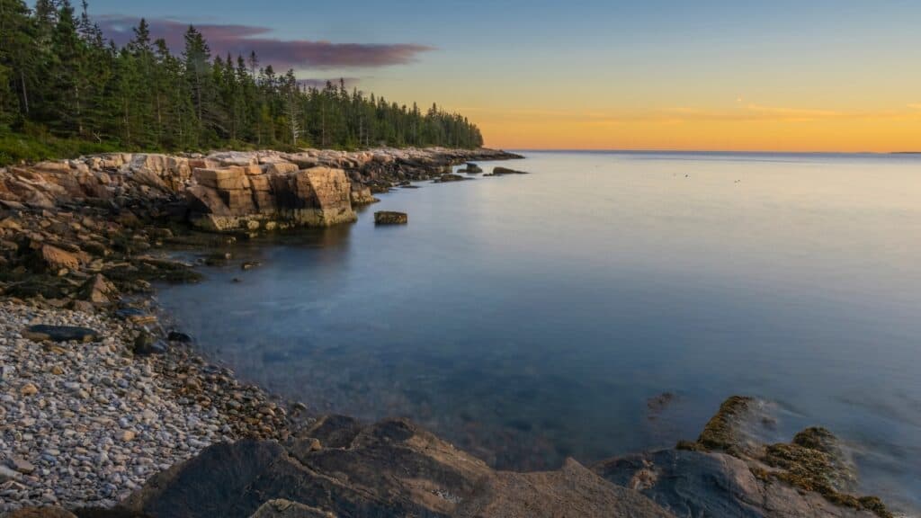 Sunset on the rugged, rocky coast of Schoodic peninsula in Acadia National Park in Maine USA