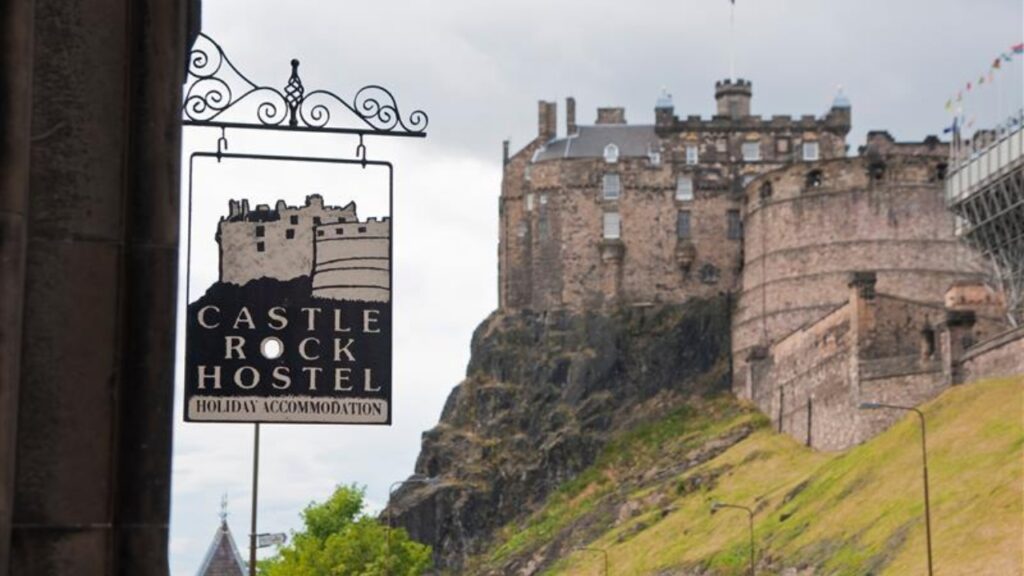 Edinburgh, Scotland - August 11, 2010: Emblem of the Castle Rock Hostel with the castle out of focus in the background. (13 matches)