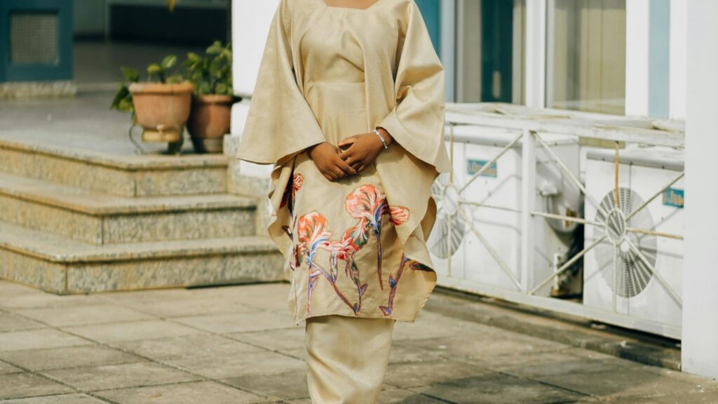 Stylish Woman in Traditional Beige Outfit Outdoors