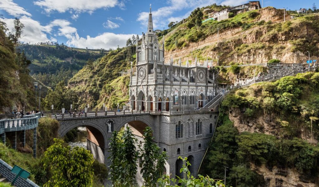 Gothic-style Las Lajas Sanctuary bridge church nestled in the dramatic green hills of Colombia.
