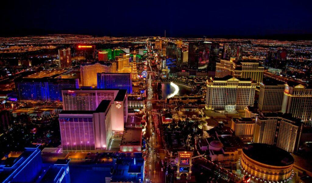 Las Vegas Strip at night with bright neon lights and famous casinos.