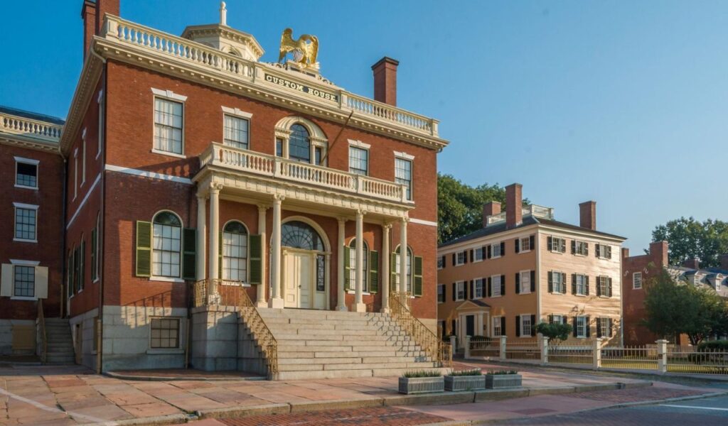 Historic Custom House building in Salem, Massachusetts, with colonial architecture and clear blue sky.