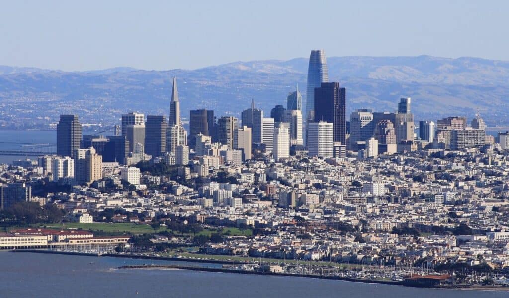San Francisco skyline with downtown buildings and waterfront on a clear day.