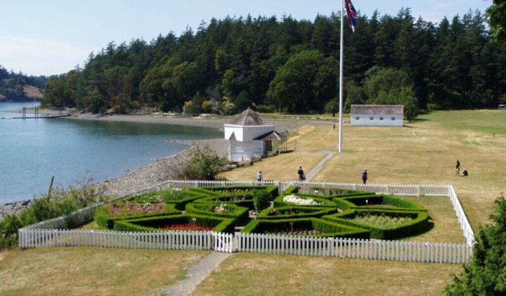 Historic garden and coastal buildings at San Juan Island National Historical Park.