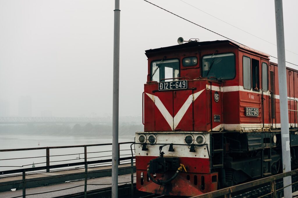 Vietnam train through rice fields